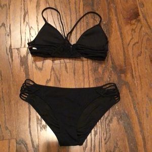 Victoria’s Secret size medium black swim suit